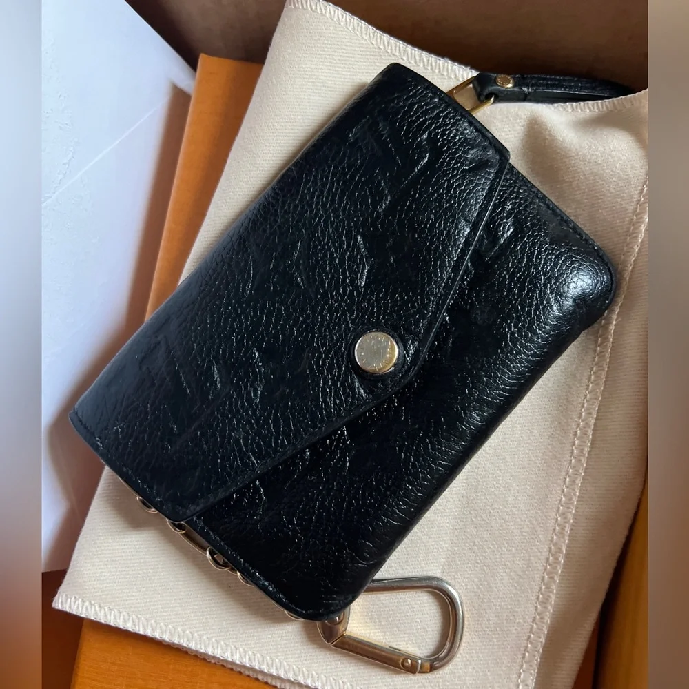 Sold Louis Vuitton Cles Empreinte Leather - Picture 1 of 13